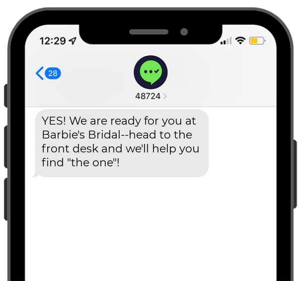 Screenshot of a bridal store appointment text notification on a mobile phone