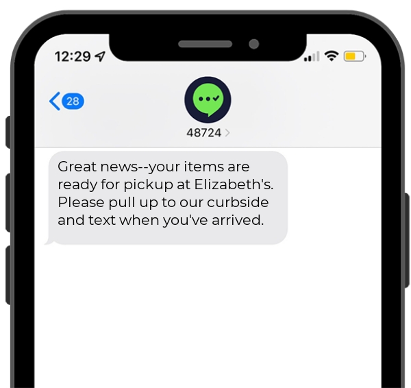 Screenshot of a curbside pickup order ready notification text notification on a mobile phone